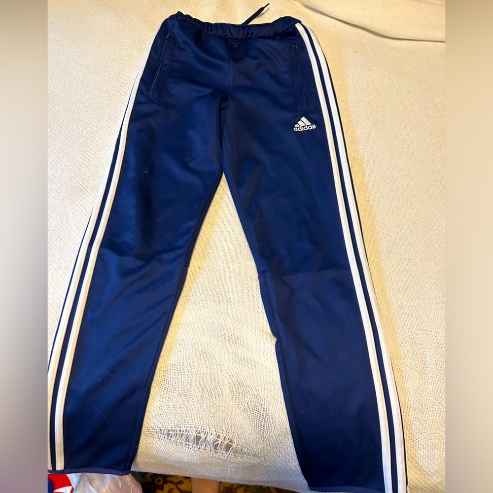 Adidas track pants.